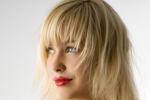 fashion portrait of blond girl with red lips