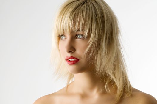 fashion portrait of blond girl with red lips