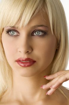 close up of beauty blond girl with fashion make up color