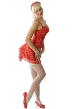 pretty blond pin up in red dress and white stockings taking pose