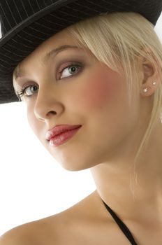 nice close up of beautiful blond girl with black hat and gray eyes