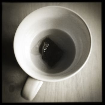 A teabag in bottom of cup