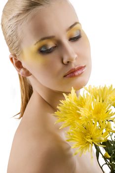 nice portrait of young cute girl with color make up and some yellow flower