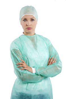 pretty young woman in green surgery dress looking in camera