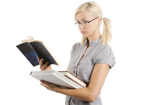 young and beautiful teacher with glasses reading a book