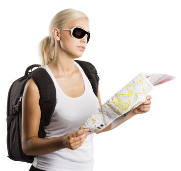 young blond girl with sunglasses looking at map isolated on white