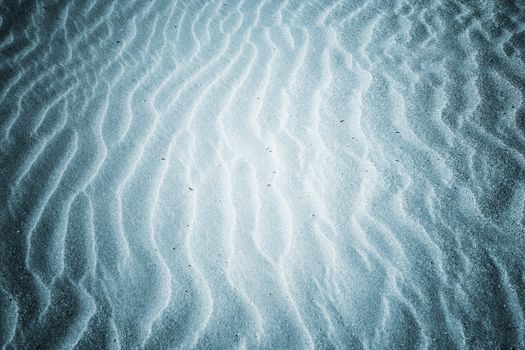 Beach with soft sand, rippled texture of windblown effect
