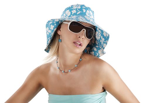 Portrait of young pretty woman in summer contest with hat and sunglasses