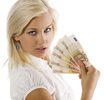 cheerful young blond lady holding euro cash and smiling