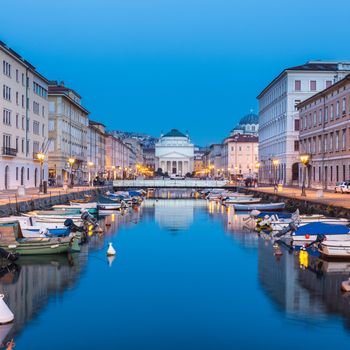 The huge church of St. Antonio Thaumaturgo is situated at the northern end of the Canale Grande. Its neo classical front facade and the cupola represents one of the emblems of the Trieste, city and seaport in northeastern Italy, Europe.