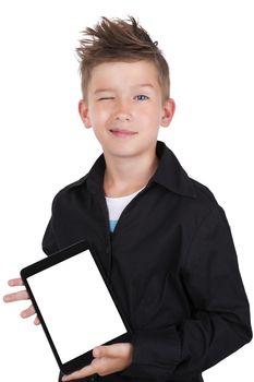 Cute casual boy holding tablet with white screen facing toward camera. Social network and internet generation Z.
