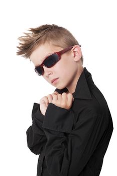 Confident cool boy with black dress shirt and sunglasses isolated on white background.