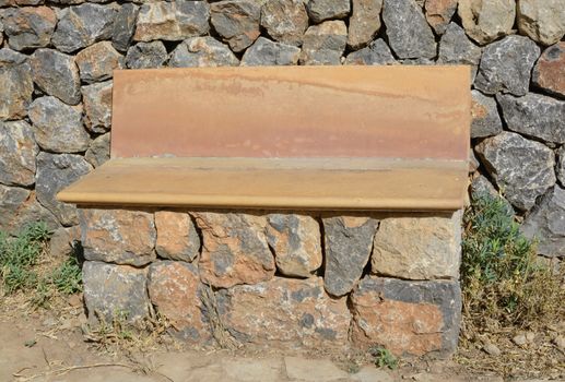 Park bench in drystone technique and terracotta.