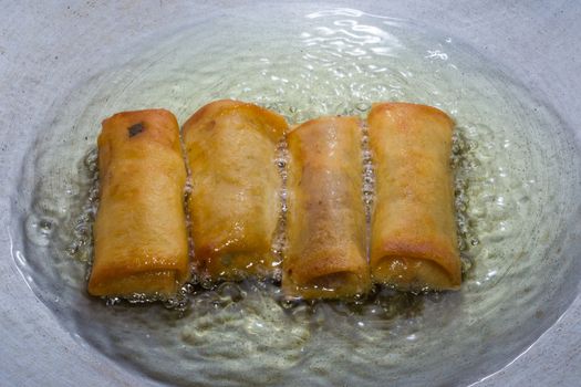 spring roll recipe are fried in the pan.