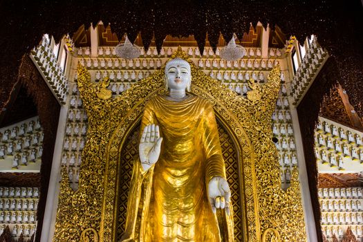 Golden Buddha statue is at Burmese Temple, Malaysia