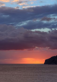 Orange blue skyscape after storm in October. Sant Elm, Mallorca, Balearic islands, Spain.
