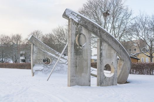 Sun Dial sculpture in Solursparken, Vallingby, Stockholm, Sweden in the winter.