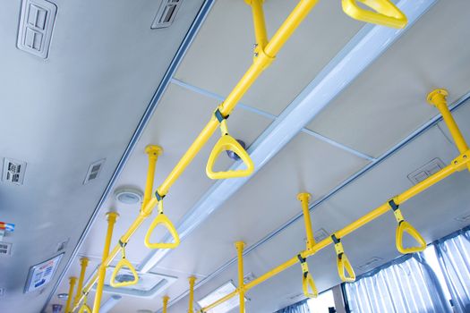 Handles for standing passenger inside a city-bus