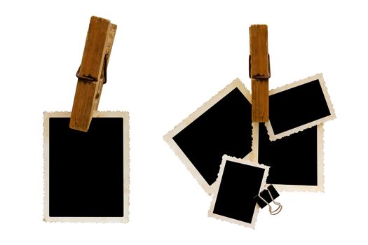 Hanging aged photo frames on white background