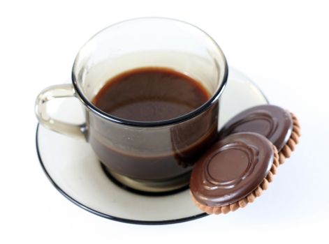 Cup with coffee and cookies.