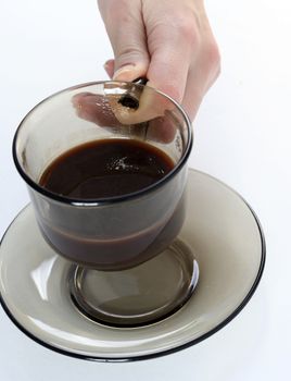 Cup with coffee and cookies.