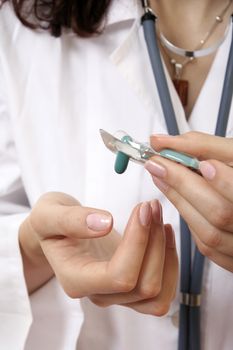 Doctor with drugs in her hands.