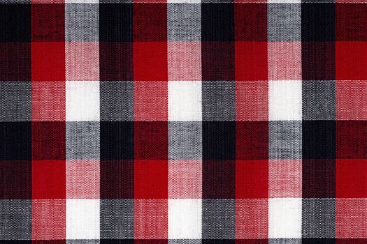 Fabric into red grid, a background or texture