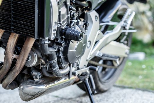 Motorcycle engine close-up detail background with shallow focus