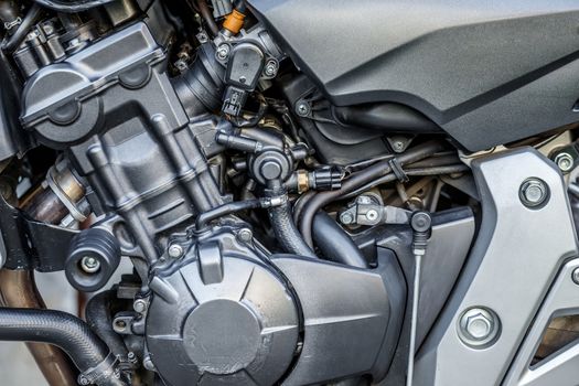 Motorcycle engine close-up detail background with shallow focus