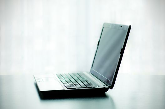 Modern laptop on desk