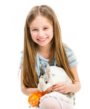 cute little girl with Easter bunny isolated on a white background