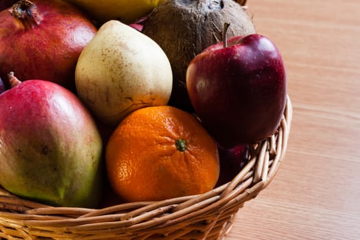 Bunch of exotic fruits in a big basket