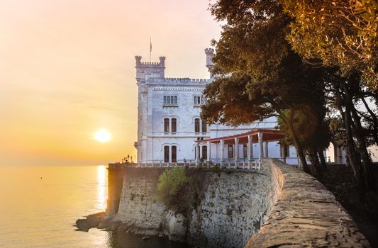 Miramare Castle, Castello di Miramare, in sunset. it is a 19th century castle on the Gulf of Trieste near Trieste, Italy. It was built for Austrian Archduke Ferdinand Maximilian.