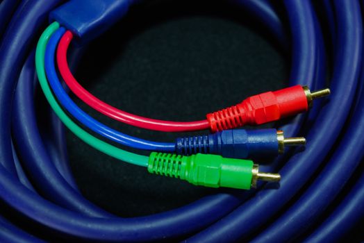 colourful cables on black scene,shallow focus