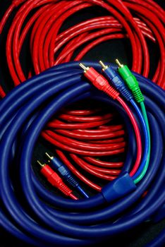 colourful cables on black scene,shallow focus