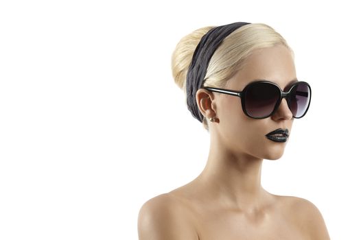 fashion portrait of young blond woman with hair style black lips and wearing sunglasses against white background