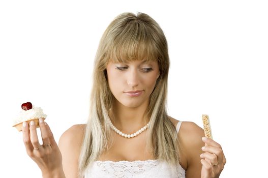 beautiful girl in hesitation to choose between sweet or diet food