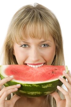 cute blond girl in red dress and red lips eating a piece of water melon