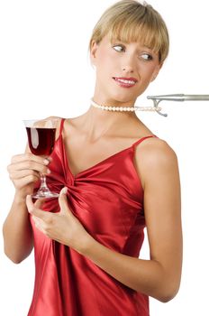 stylish blond girl hooked from her pearl necklace and making face
