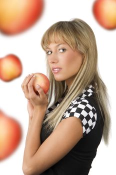 nice blond with a red apple in her hands and a checked black and white dress