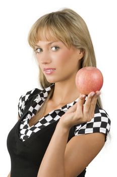 pretty girl keeping a red apple on the point of her fingers dressed in black and white