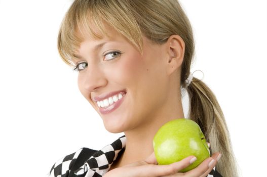 nice blond girl with a green apple on one hand with a great smile