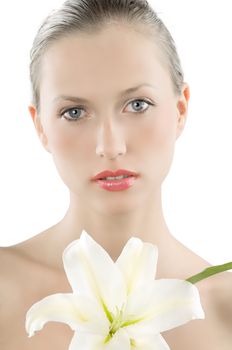 young and beautiful woman with a white lily and a skin like a doll