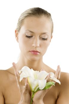 young and beautiful woman with a white lily in a fresh portrait