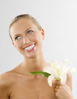 nice portrait of a sunly and pretty girl with a great smile and looking up