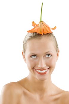 nice girl smiling with an orange flower on her head used like a hat