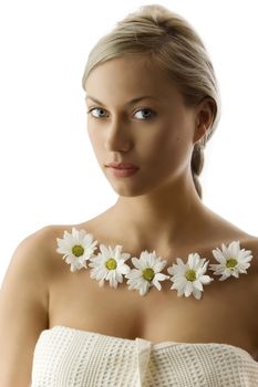 beauty portrait of a beautiful woman with twist braid and necklace of white daisy