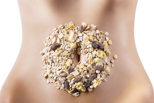 mixture of oatmeal and dried fruit placed around the navel