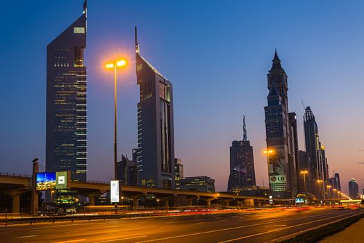 DUBAI, UAE - NOVEMBER 14: Modern skyscrapers, Sheikh zayed roads on November 14, 2013 in Dubai, United Arab Emirates. Dubai is the fastest growing city in the world.