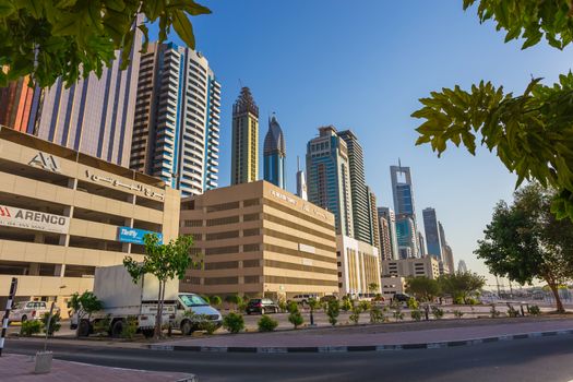 DUBAI, UAE - NOVEMBER 9: Modern skyscrapers, Sheikh zayed roads on November 9, 2013 in Dubai, United Arab Emirates. Dubai is the fastest growing city in the world.
